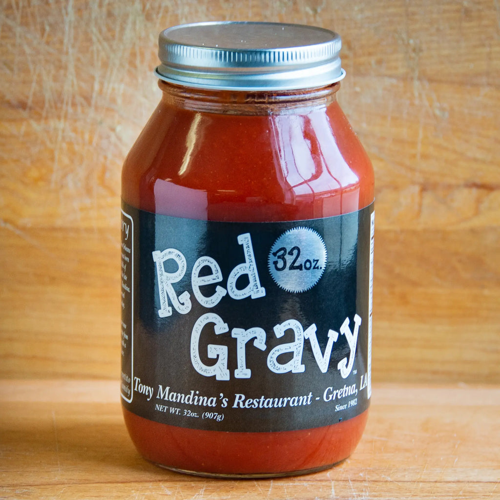 Jar of Tony Mandina's Red Gravy on a wooden background